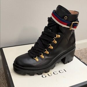 Gucci Black Leather combat Lace-Up Boots with Gold accents